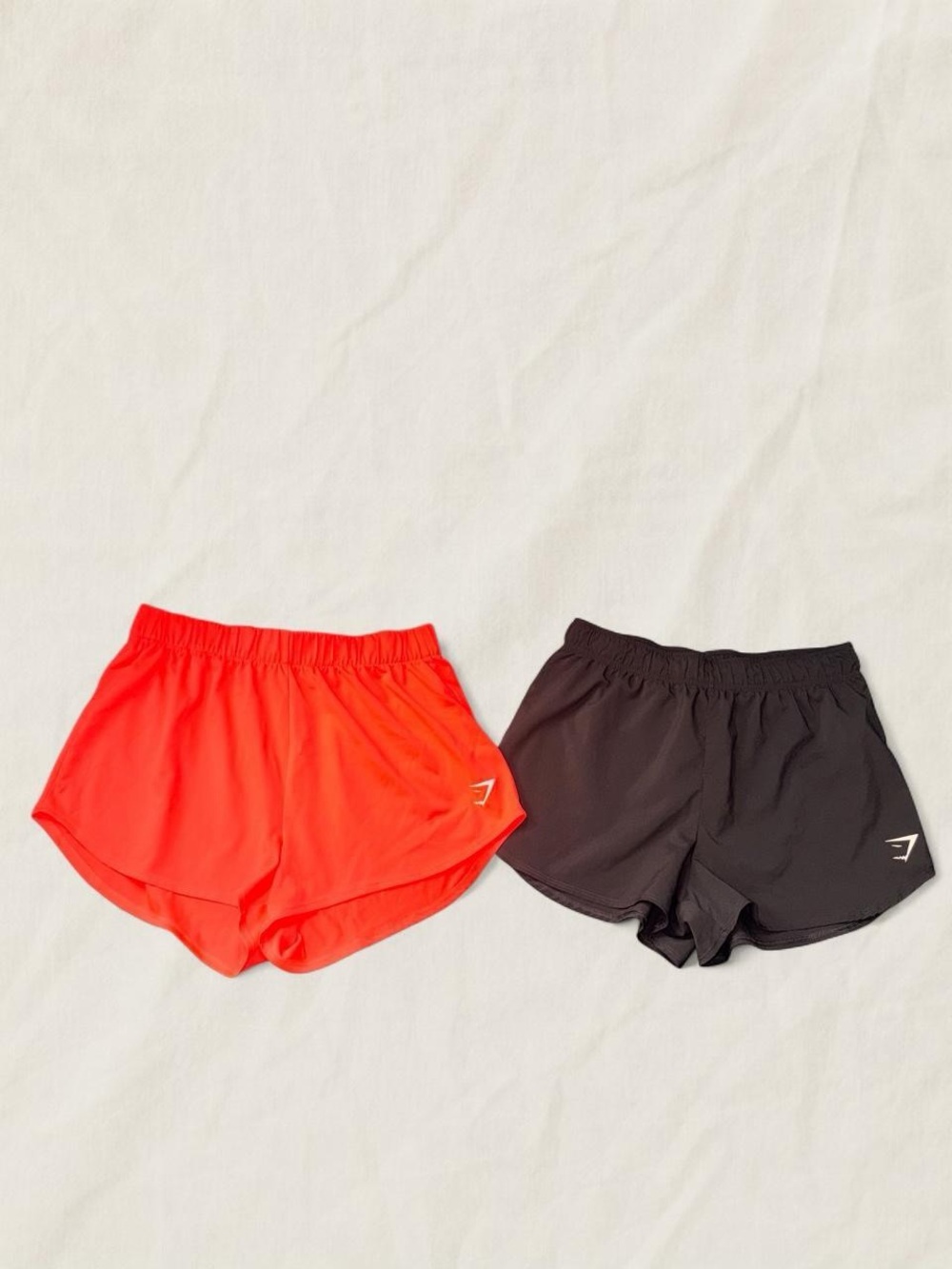 Gymshark Women’s Athletic Running Shorts — Bright Orange & Black